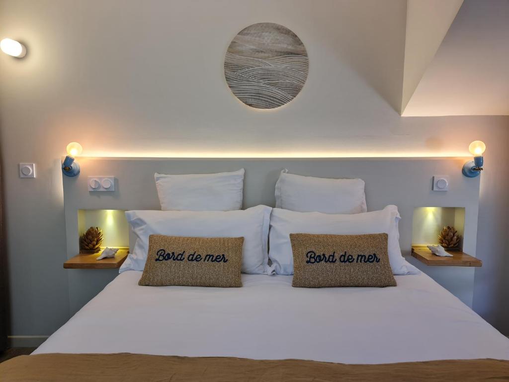 Katil atau katil-katil dalam bilik di H&ocirc;tel Le C - Boutique H&ocirc;tel