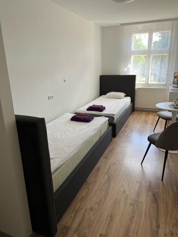 Postel nebo postele na pokoji v ubytování Edgari Guesthouse