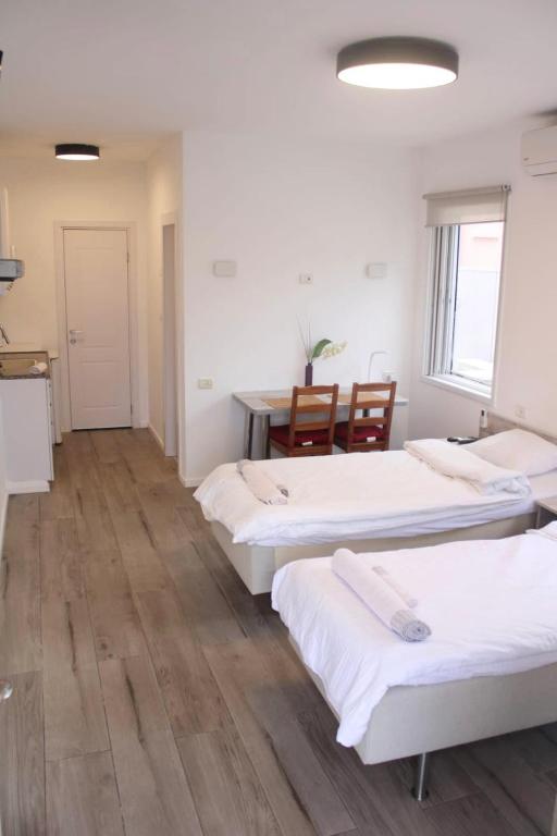 Postel nebo postele na pokoji v ubytování Zimmer Ba'Ir