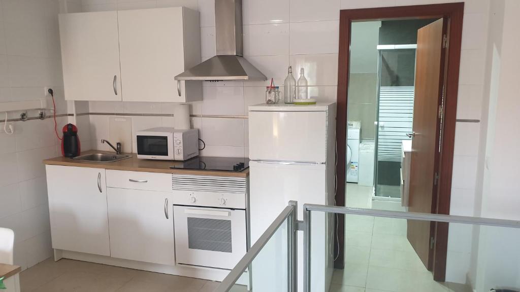 Kuchyň nebo kuchyňský kout v ubytování Apartamento Málaga, en El Palo