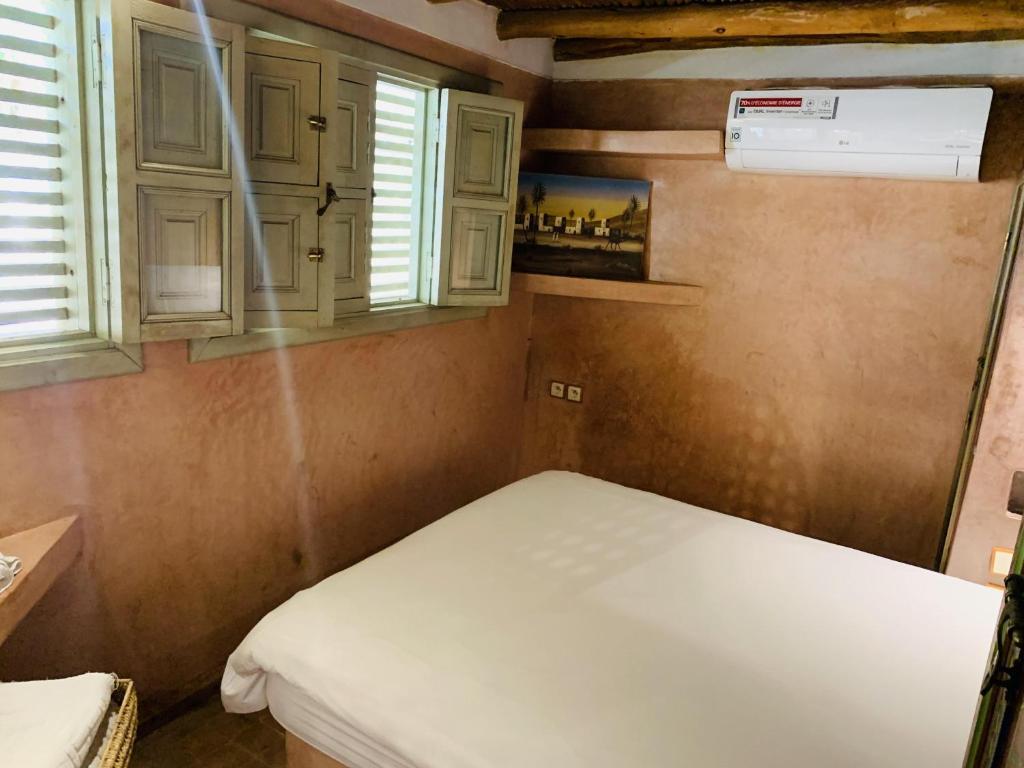 Postel nebo postele na pokoji v ubytování Riad Moullaoud