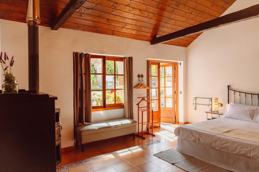 Postel nebo postele na pokoji v ubytování EcoVerode Hotel Emblemático Vegetariano Vegano