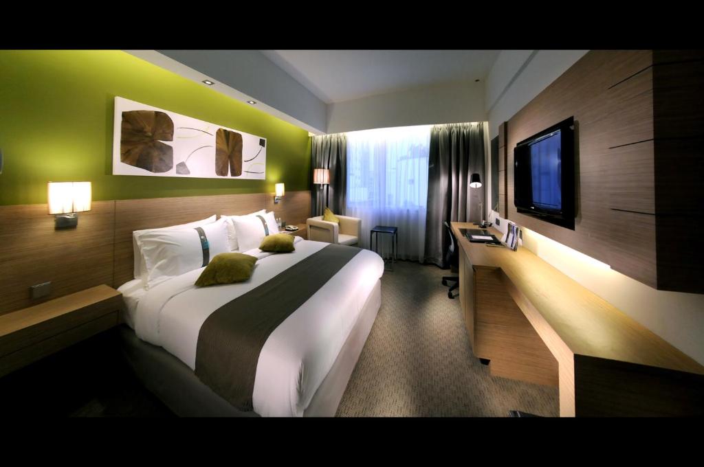 TV a/nebo společenská místnost v ubytování Grand Margherita Hotel