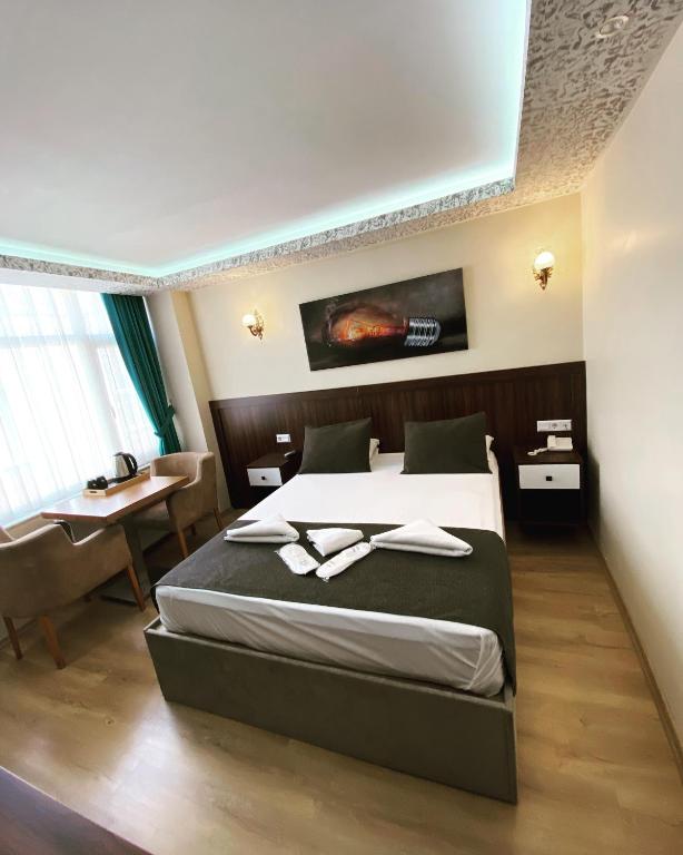 Katil atau katil-katil dalam bilik di ÜSKÜDAR OTEL