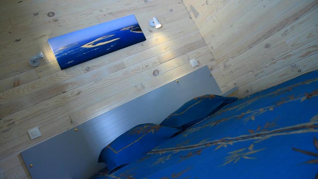 Postel nebo postele na pokoji v ubytování Espace Pyrenees Loisirs