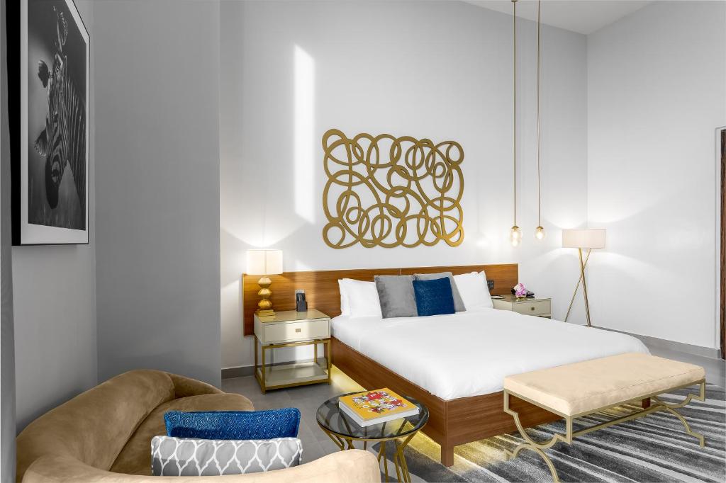 Ένα ή περισσότερα κρεβάτια σε δωμάτιο στο The Art Hotel