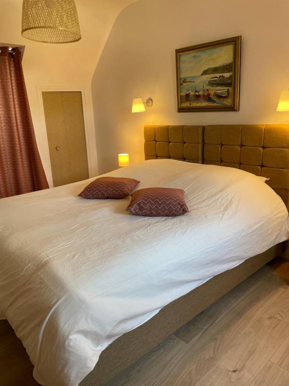Postel nebo postele na pokoji v ubytování Gîte Maez 4 pers 29450 sizun