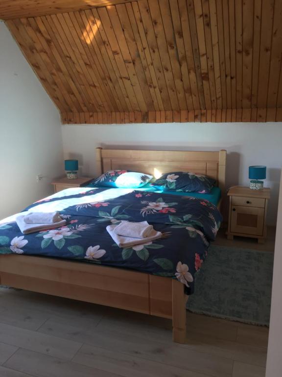 Postel nebo postele na pokoji v ubytování Apartman DoM