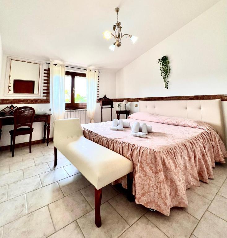 Postel nebo postele na pokoji v ubytování Resort Umbria Spa