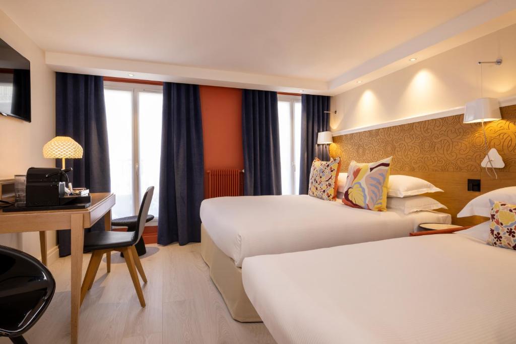 Postel nebo postele na pokoji v ubytování Hotel Elysees 8