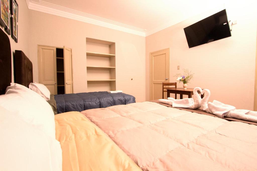 TV a/nebo společenská místnost v ubytování Hostal Virreinal AQP