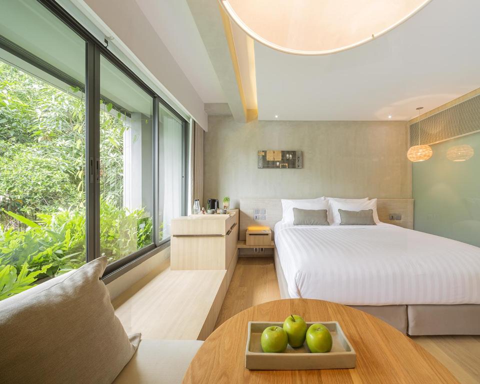 Postel nebo postele na pokoji v ubytování Ad Lib Hotel Bangkok