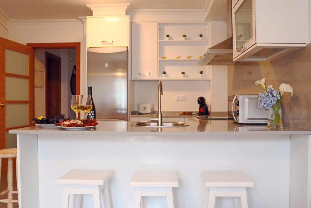 Kuchyň nebo kuchyňský kout v ubytování Apartamento Rosalía