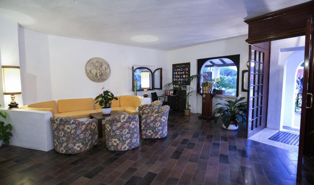 Telewizja i/lub zestaw kina domowego w obiekcie Hotel Cala di Mola