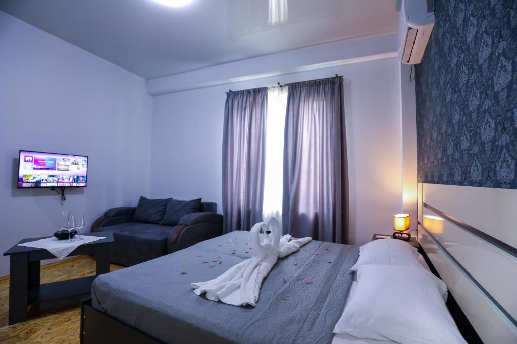 Postel nebo postele na pokoji v ubytování Hotel Sagu