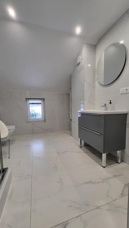 Kúpeľňa v ubytovaní Apartamenty 8 i 10 osobowe Koniakówka Resort