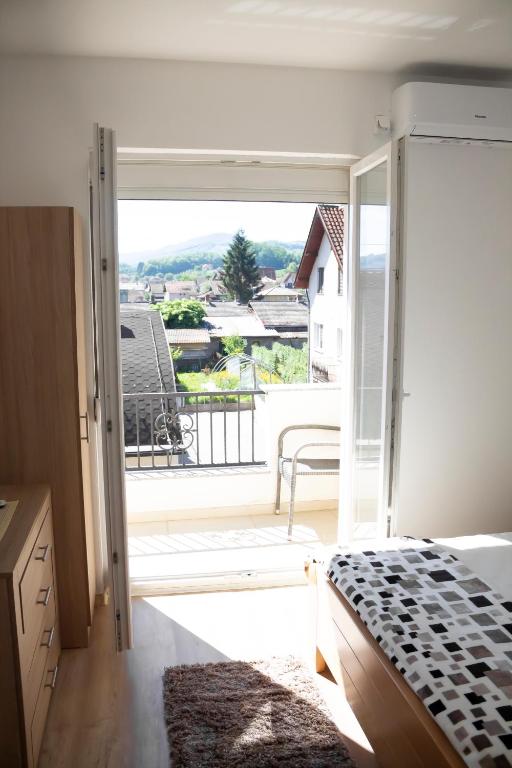Postel nebo postele na pokoji v ubytování JTP Apartmani Ivanjica