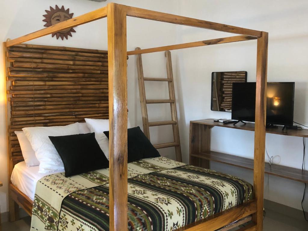 Postel nebo postele na pokoji v ubytování New Nautilus Lodge