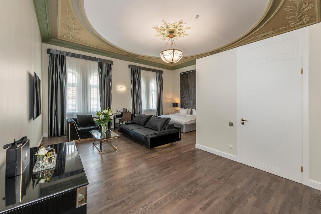 TV a/nebo společenská místnost v ubytování St Palace Hotel