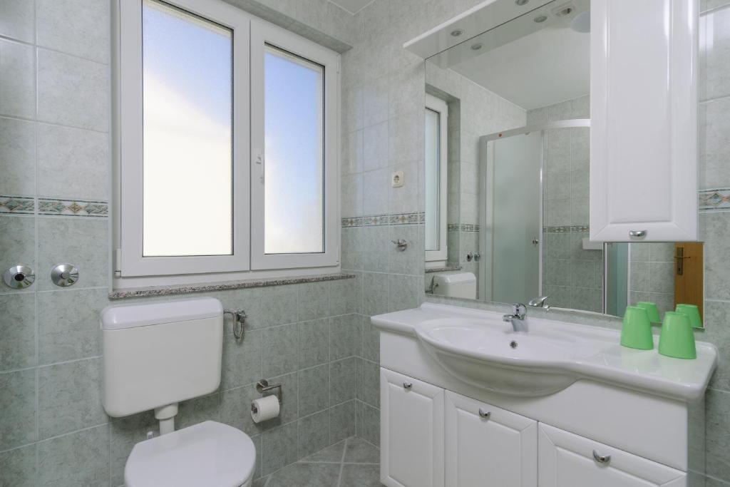 Kúpeľňa v ubytovaní Apartmani Emil