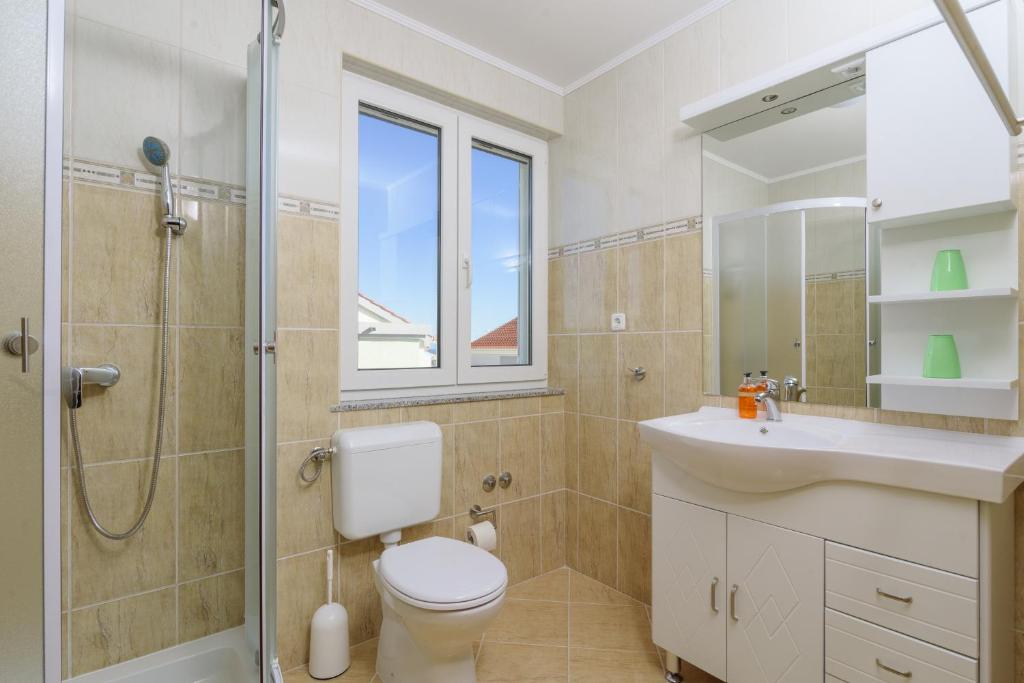 Kúpeľňa v ubytovaní Apartmani Emil