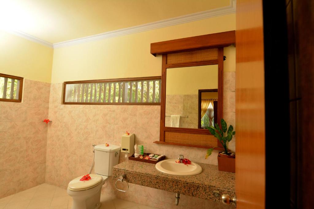 Koupelna v ubytování Banyualit Spa 'n Resort Lovina