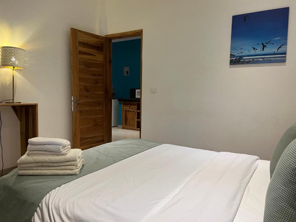 Postel nebo postele na pokoji v ubytování New Nautilus Lodge