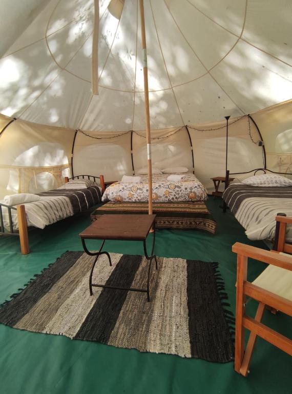 Postel nebo postele na pokoji v ubytování Glamping Remanso del Espíritu