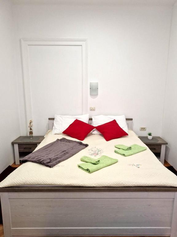 Posteľ alebo postele v izbe v ubytovaní Apartmani Tower
