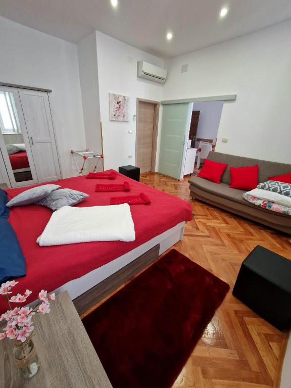 Posteľ alebo postele v izbe v ubytovaní Apartmani Tower