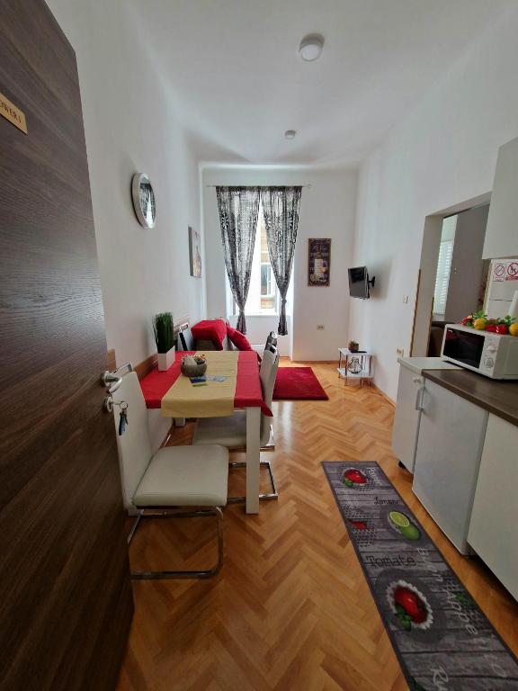 Kuchyňa alebo kuchynka v ubytovaní Apartmani Tower