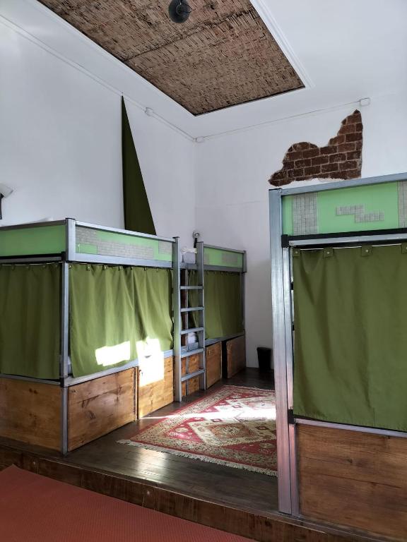 Postel nebo postele na pokoji v ubytování Tenerife Art Hostel