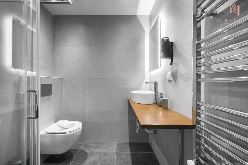 Kúpeľňa v ubytovaní P30, Nilie Hospitality MGMT