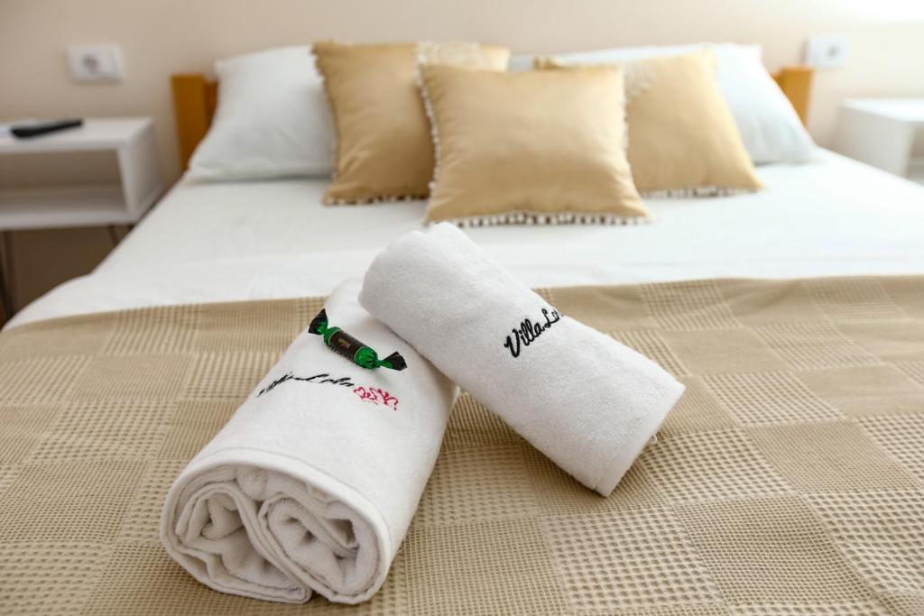 Postel nebo postele na pokoji v ubytování Vila LOLA