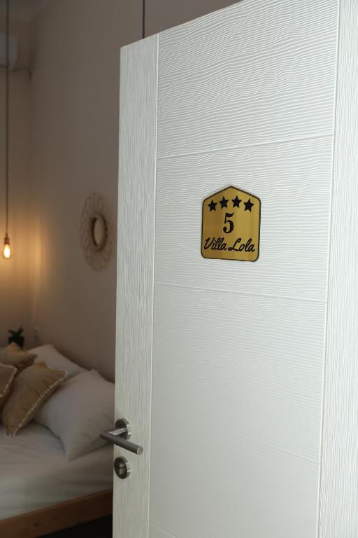 Postel nebo postele na pokoji v ubytování Vila LOLA