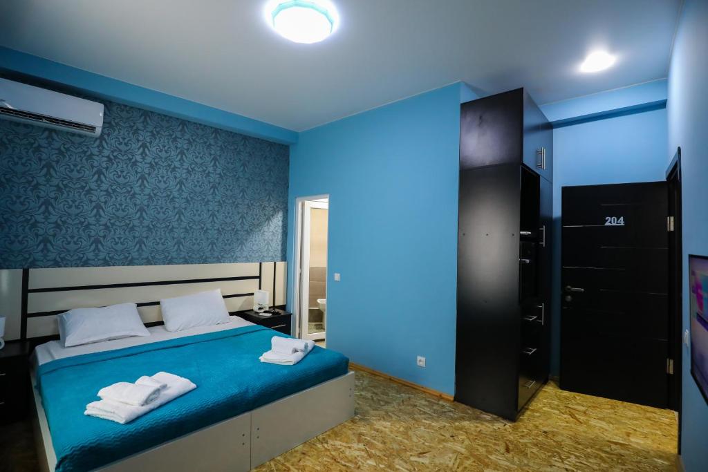 Postel nebo postele na pokoji v ubytování Hotel Sagu