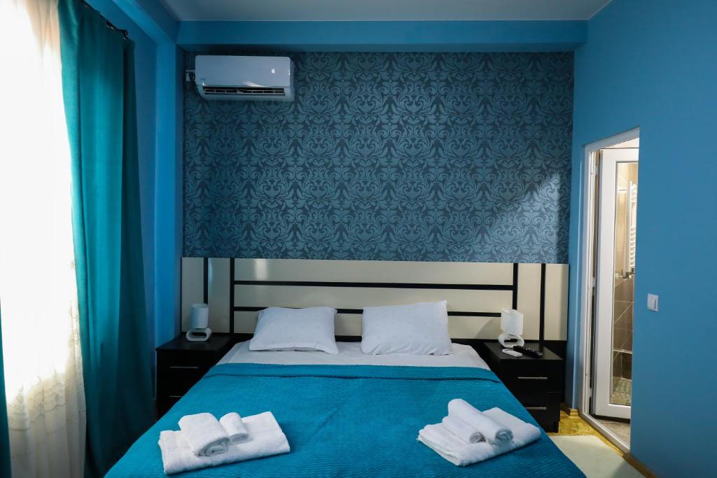 Postel nebo postele na pokoji v ubytování Hotel Sagu