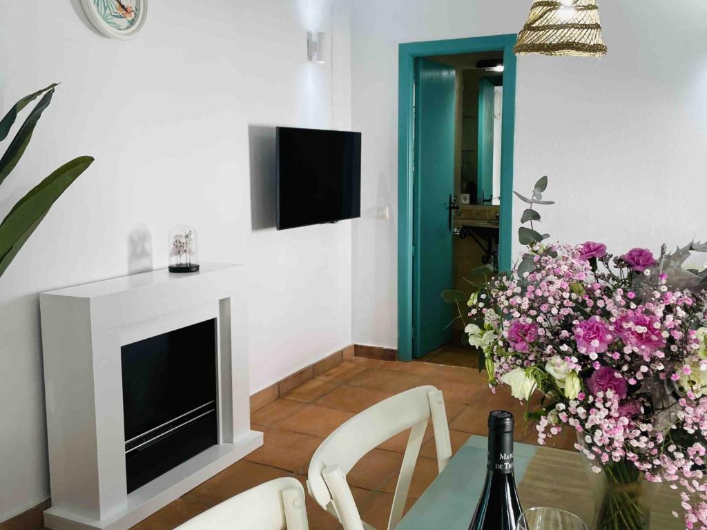 Televízia a/alebo spoločenská miestnosť v ubytovaní Apartamento ALAZUL Campillo