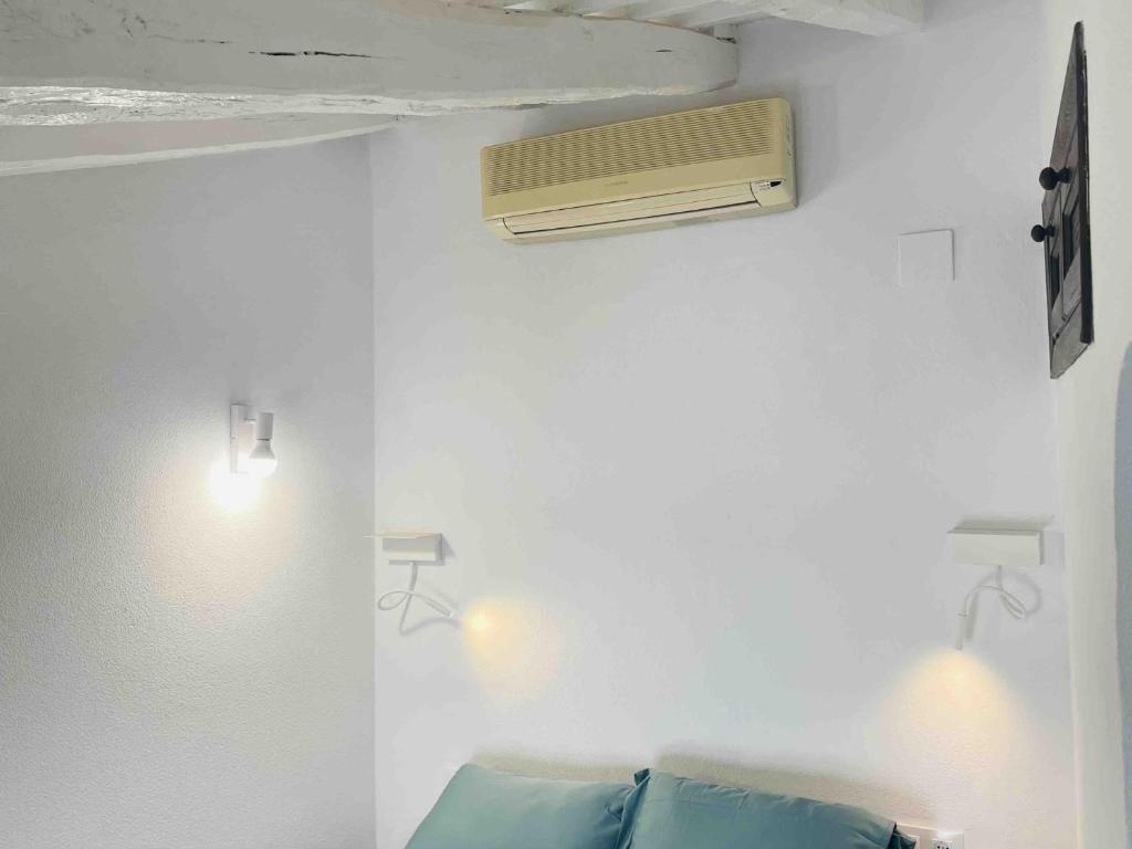 Televízia a/alebo spoločenská miestnosť v ubytovaní Apartamento ALAZUL Campillo