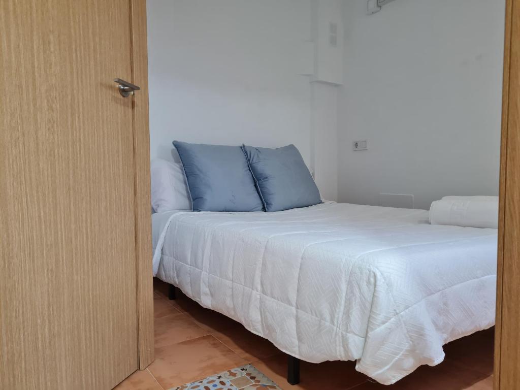 Cama o camas de una habitación en MálagaSuite Picturesque Apartment