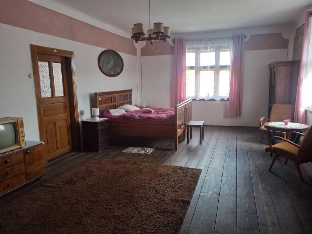 Postel nebo postele na pokoji v ubytování Apartmán Měňany
