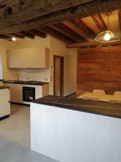 Kuchyň nebo kuchyňský kout v ubytování Cozy tiny flat in Cadore Dolomiti