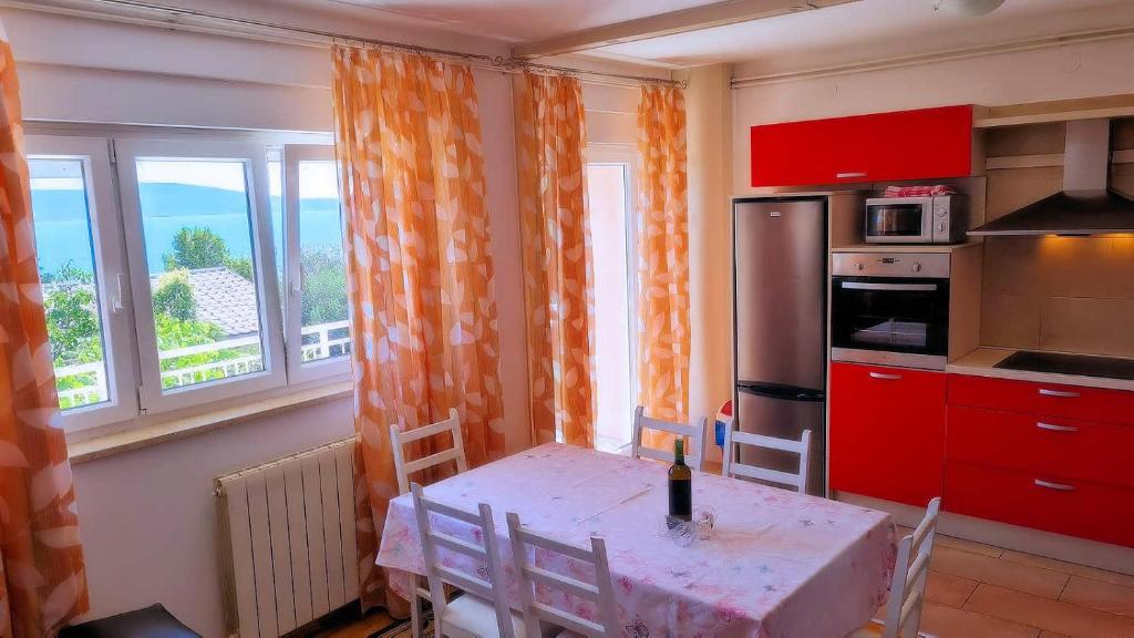 Kuchyň nebo kuchyňský kout v ubytování Apartmens Adriana