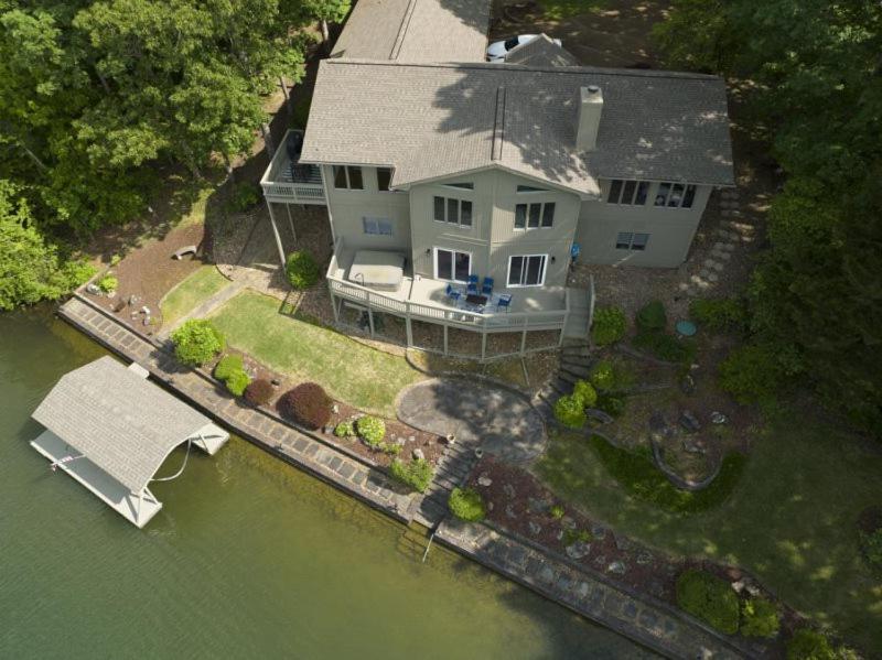 an aerial view of a large house on the water at 18906 - 6 Zapato Circle in Hot Springs