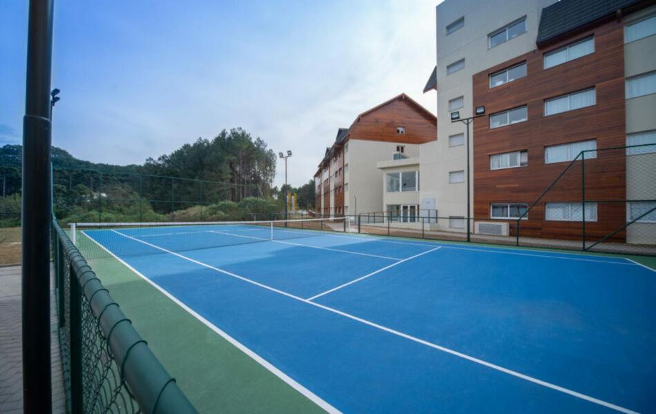 Tenis a/nebo squash v ubytování Golden gramado resort Laghetto nebo okolí
