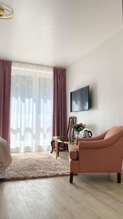 TV a/nebo společenská místnost v ubytování Villa K2