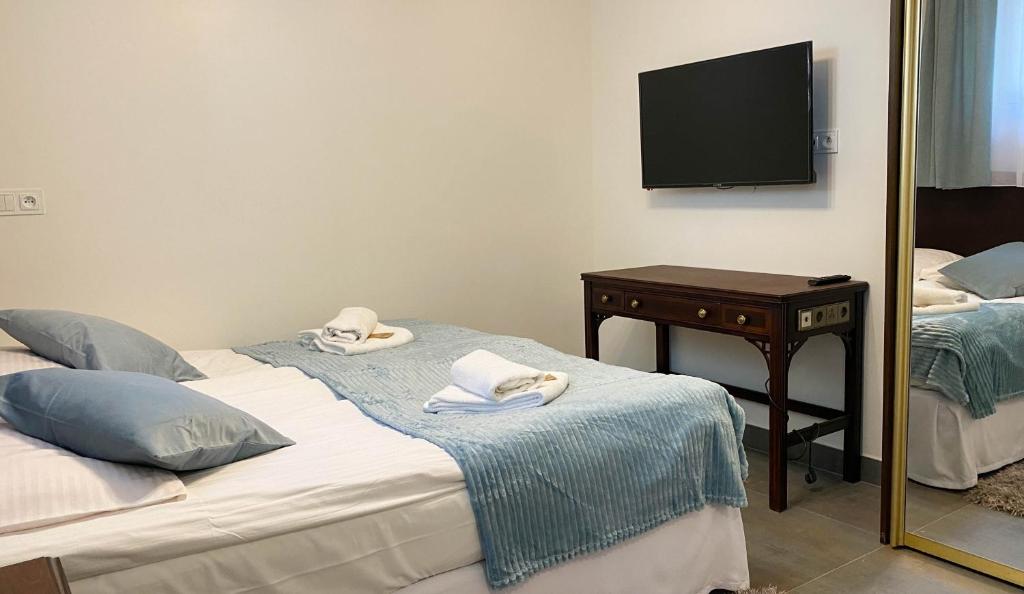 Postel nebo postele na pokoji v ubytování Villa K2