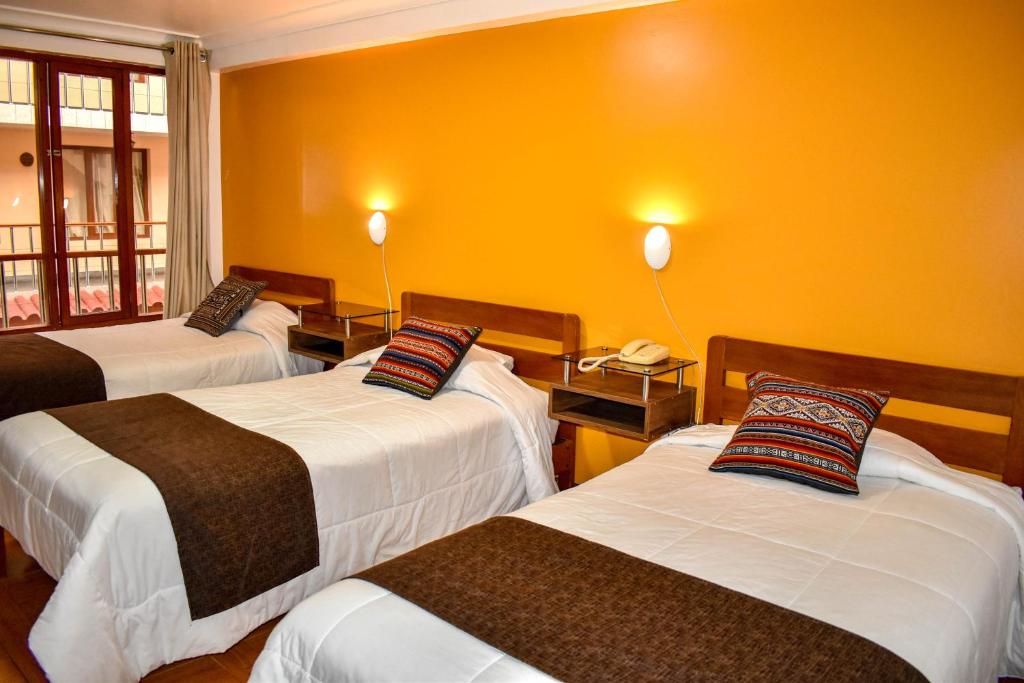 Postel nebo postele na pokoji v ubytování Hotel del Sur