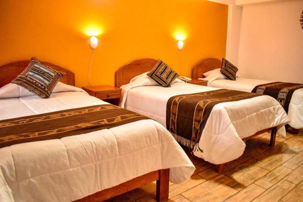 Postel nebo postele na pokoji v ubytování Hotel del Sur