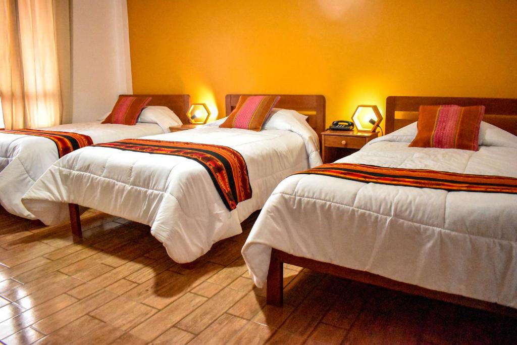 Postel nebo postele na pokoji v ubytování Hotel del Sur